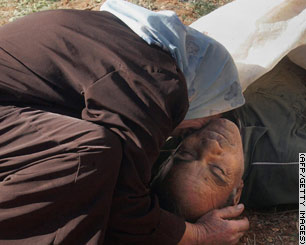 Photo via CNN: A woman mourns after the Baalbeck attack.